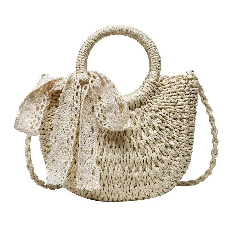 Borsa paglia intrecciata semicircolare in paglia naturale, beige e khaki, con manici rotondi e versione con fiocco Ribbon, vista frontale su fondo neutro