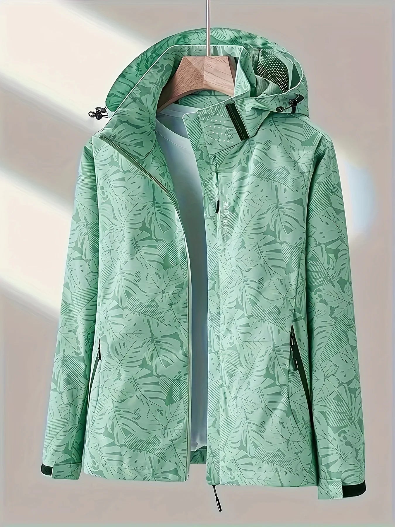 Giacca running donna con stampa foglia, cappuccio staccabile – antivento, waterproof e versatile per hiking