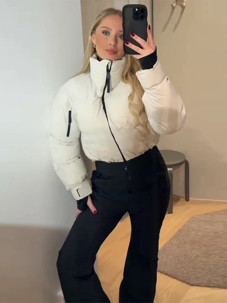 Abbigliamento neve donna: giacca, pantaloni o tuta
