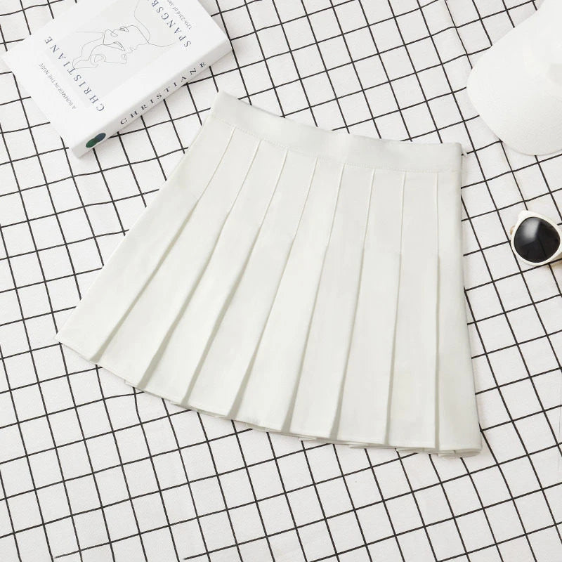 Gonna plissettata cortissima a vita alta – stile uniforme