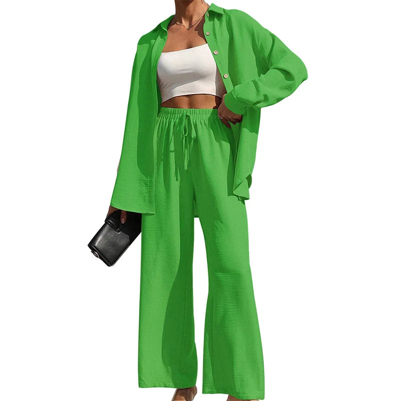 Set donna primavera–estate 2025 – camicia con bottoni e pantaloni wide-leg a vita alta
