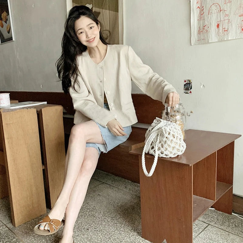 Borsa a secchiello in paglia intrecciata a mano – con coulisse e tracolla, perfetta per spiaggia e shopping