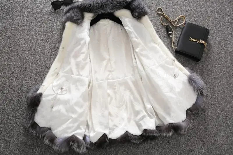 Cappotto lungo in pelliccia sintetica con cappuccio – giacca maxi donna calda e lussuosa per l'inverno 2025