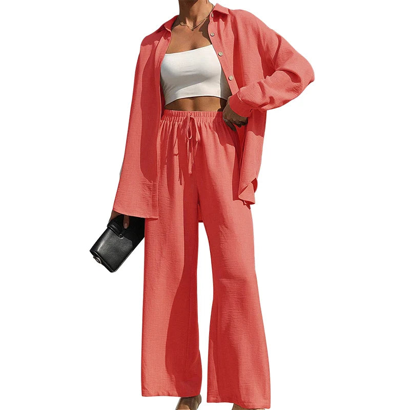 Set donna primavera–estate 2025 – camicia con bottoni e pantaloni wide-leg a vita alta
