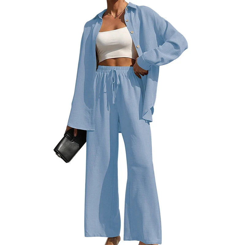 Set donna primavera–estate 2025 – camicia con bottoni e pantaloni wide-leg a vita alta