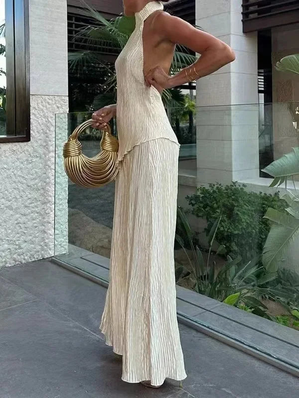 Set donna elegante con top irregolare + pantaloni a zampa bell bottom – completo fashion sexy per outfit da sera / casual chic