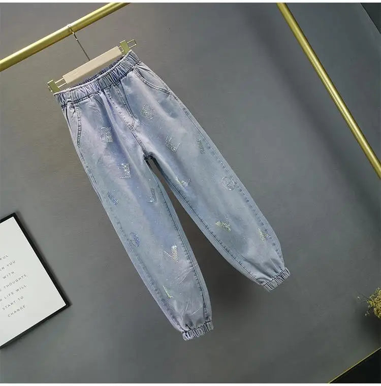 Jeans Donna Vita Alta con Gamba Larga e Vita Elasticizzata –Estate 2025