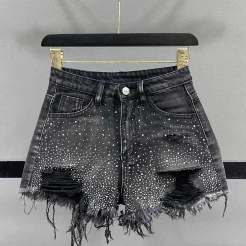 Shorts jeans donna strappati con strass – Vita alta estate 2025