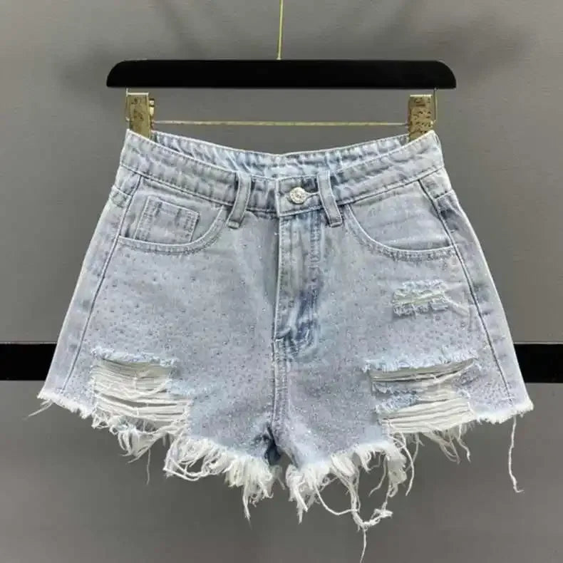 Shorts jeans donna strappati con strass – Vita alta estate 2025