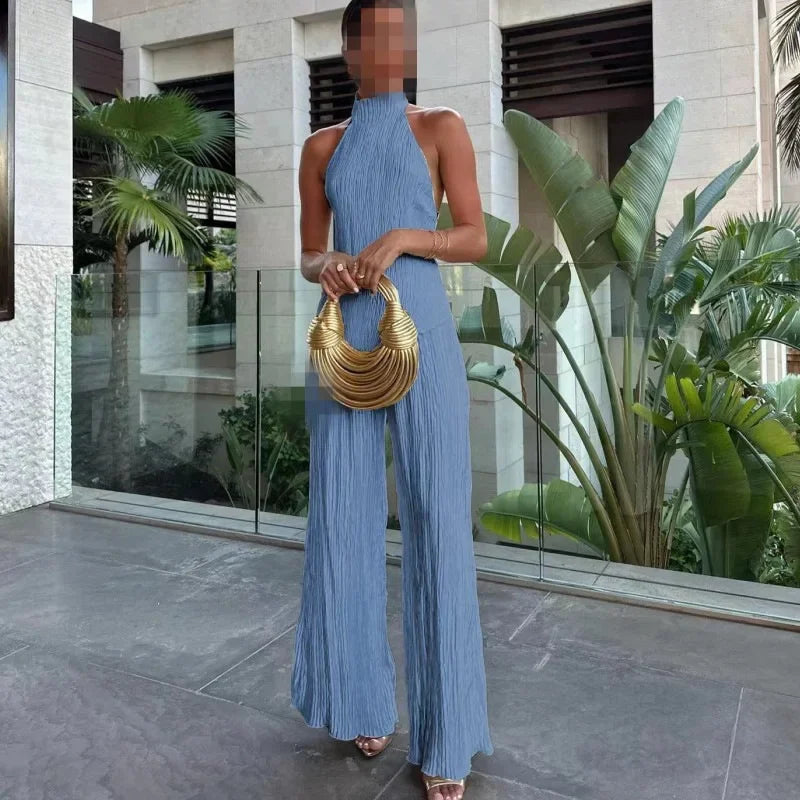 Set donna elegante con top irregolare + pantaloni a zampa bell bottom – completo fashion sexy per outfit da sera / casual chic