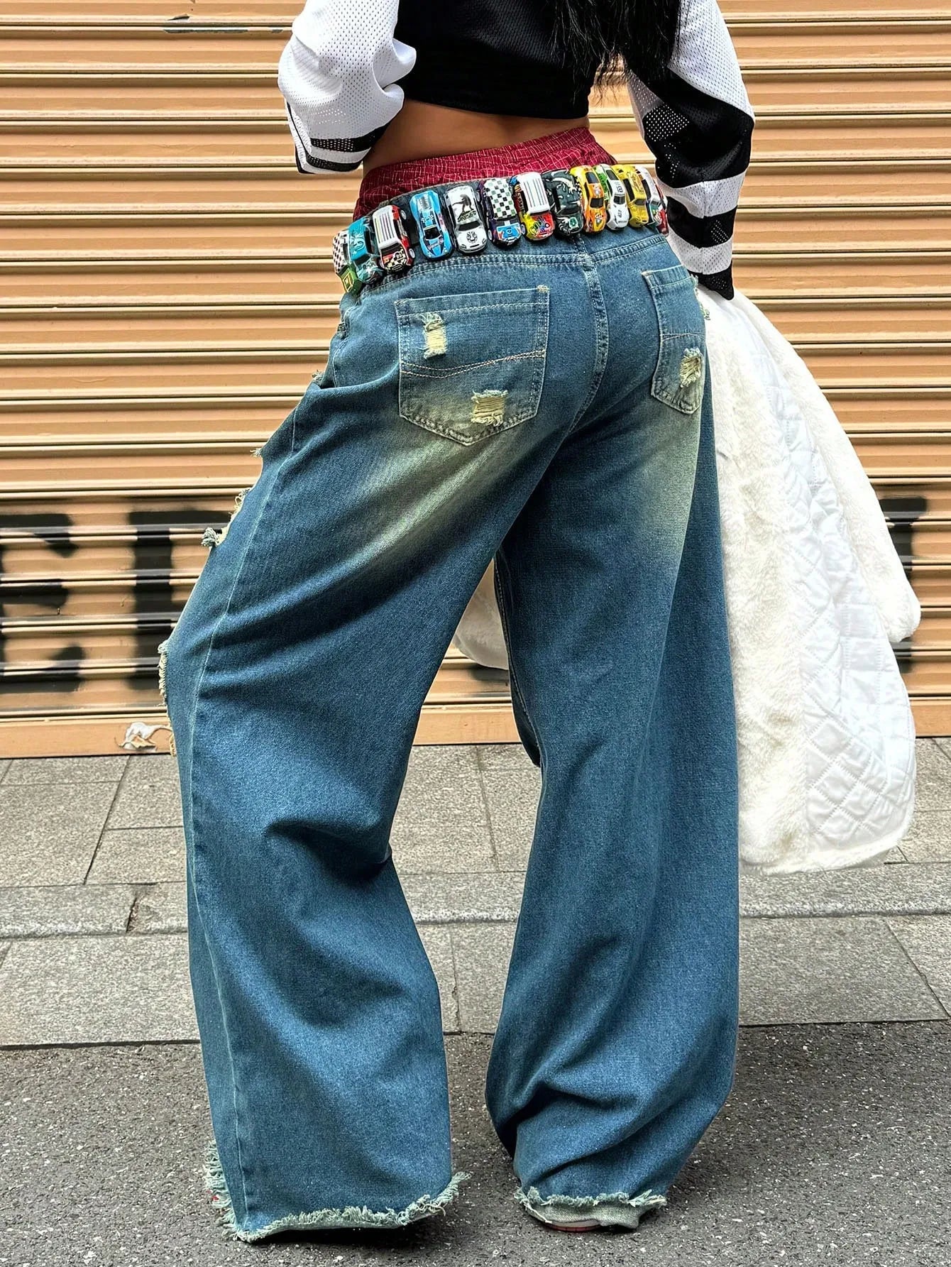 Jeans Donna Y2K Vita Alta con Strappi e Orlo a Taglio Vivo – Denim Streetwear per Look Urban e Ribelle