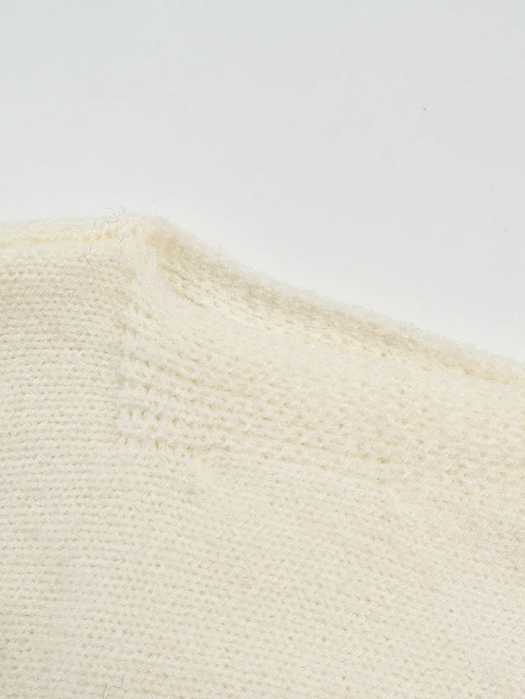 Maglione donna asimmetrico a collo alto e maniche lunghe
