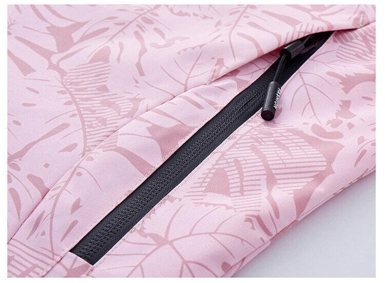 Giacca running donna con stampa foglia, cappuccio staccabile – antivento, waterproof e versatile per hiking