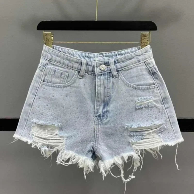 Shorts jeans donna strappati con strass – Vita alta estate 2025