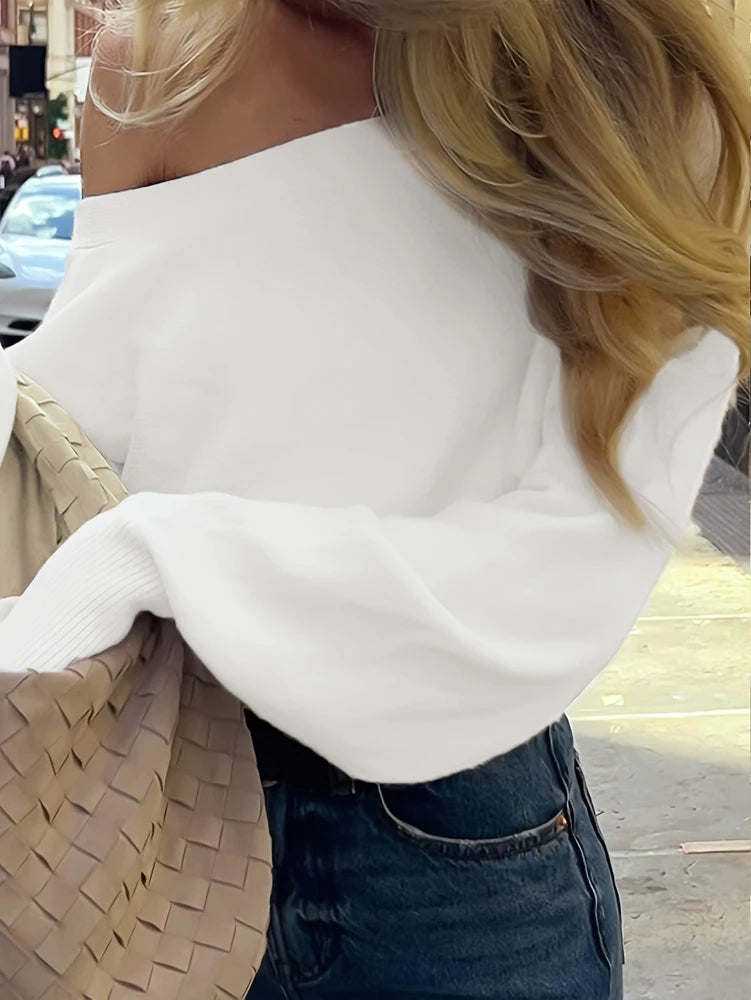 Maglione donna asimmetrico a collo alto e maniche lunghe