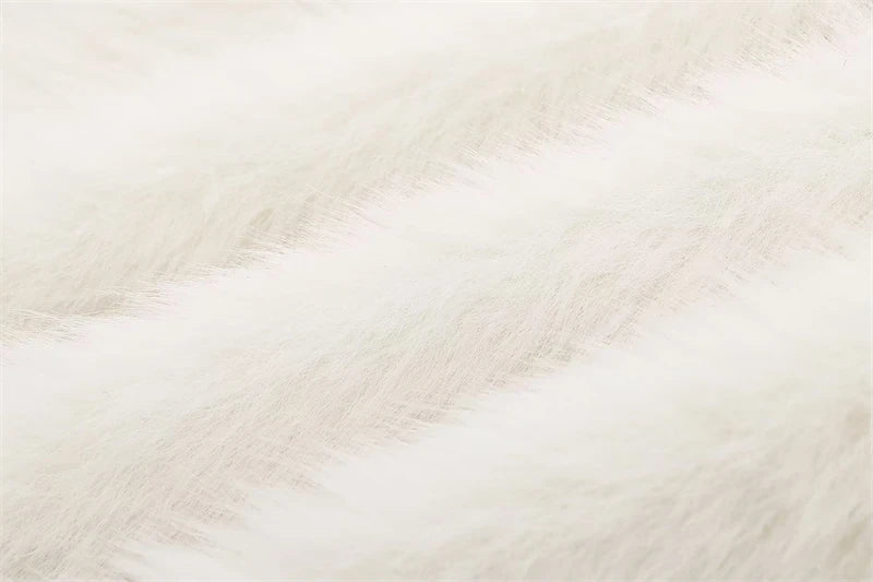 Maglia donna effetto pelliccia corta con girocollo