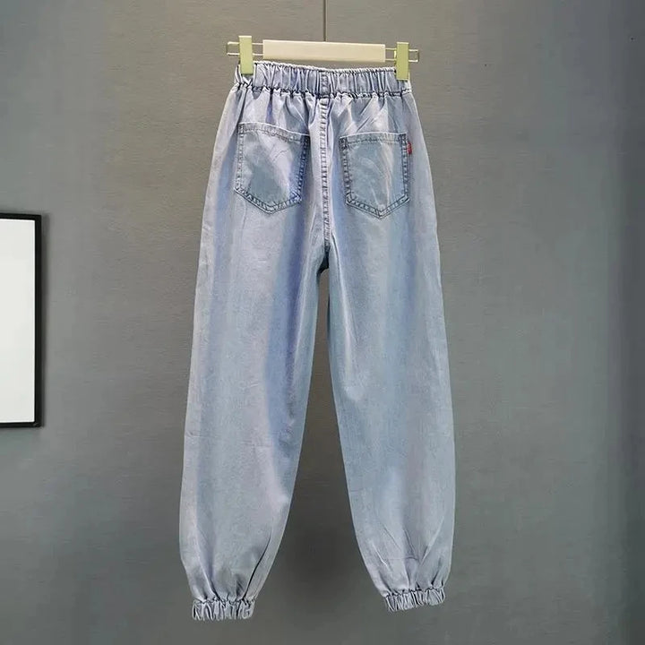 Jeans Donna Vita Alta con Gamba Larga e Vita Elasticizzata –Estate 2025