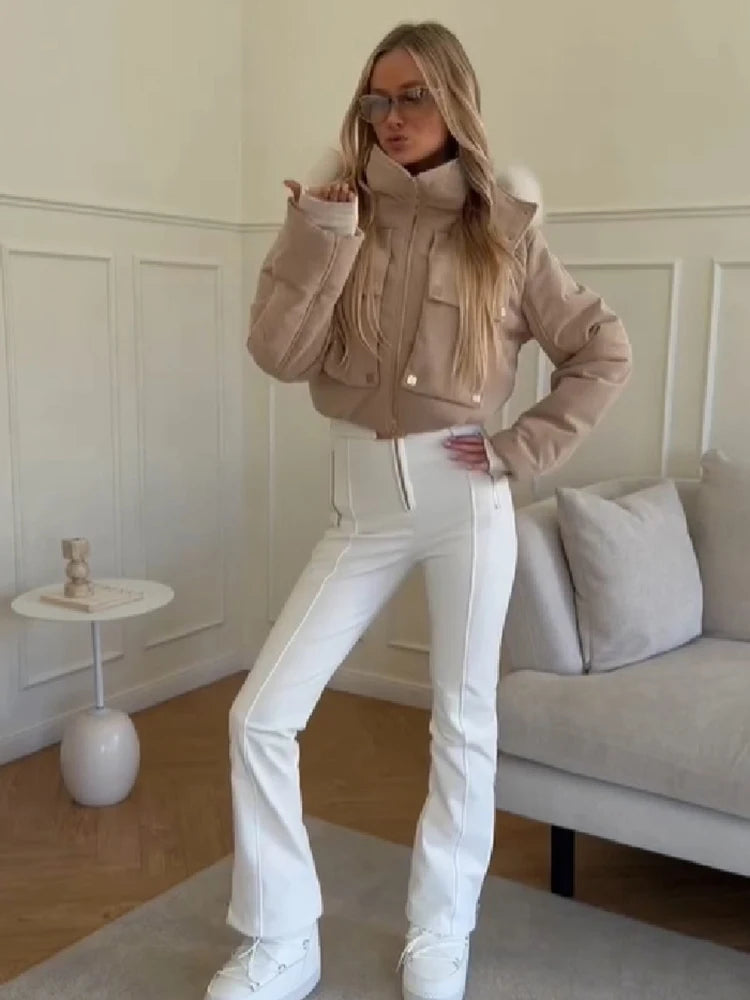 Tuta intera donna imbottita con cappuccio e pantaloni a zampa - foto 9 della galleria