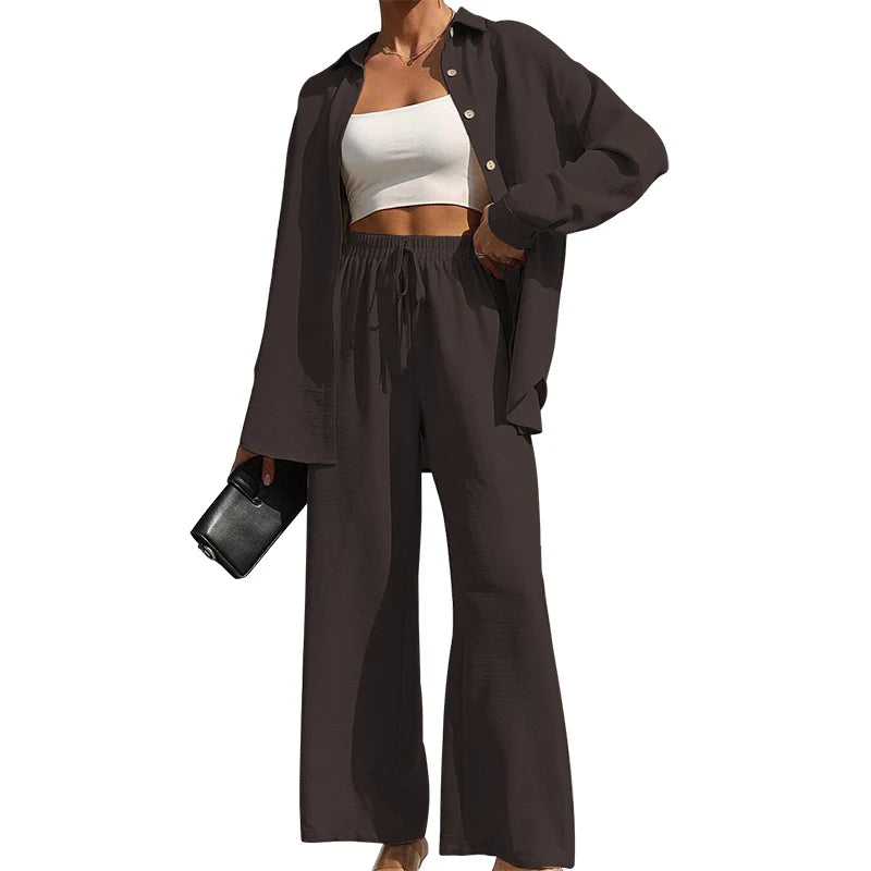 Set donna primavera–estate 2025 – camicia con bottoni e pantaloni wide-leg a vita alta