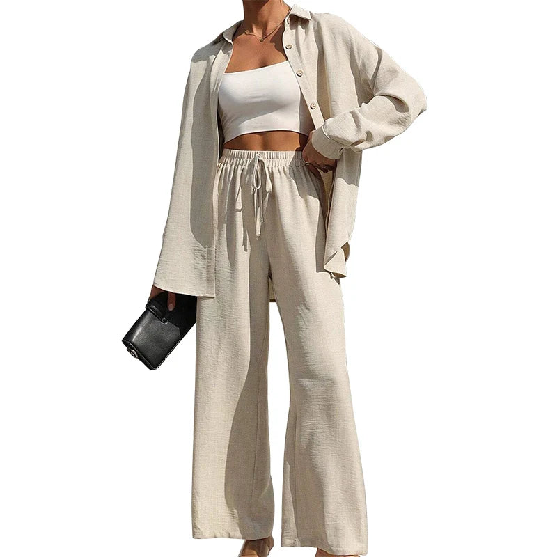 Set donna primavera–estate 2025 – camicia con bottoni e pantaloni wide-leg a vita alta