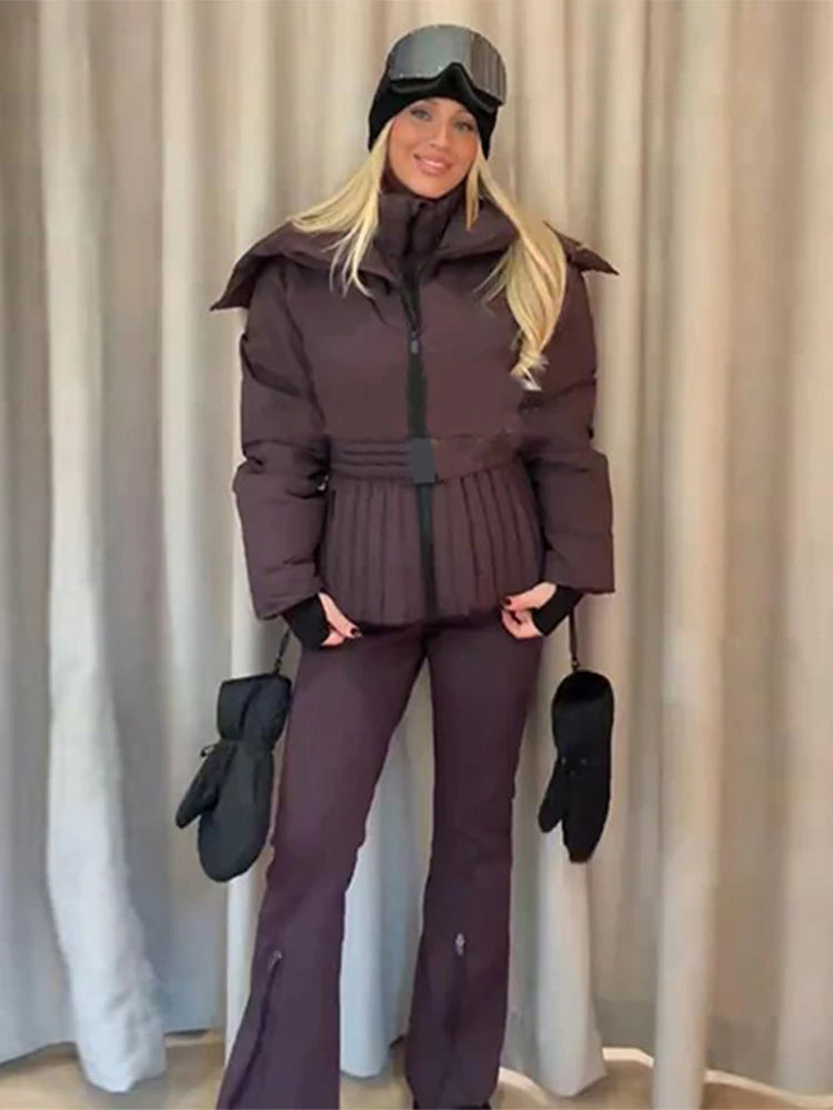 Abbigliamento neve donna: giacca, pantaloni o tuta