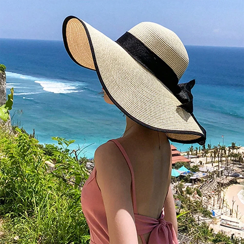 Cappello donna estivo in paglia con fiocco decorativo, tesa larga e colori eleganti