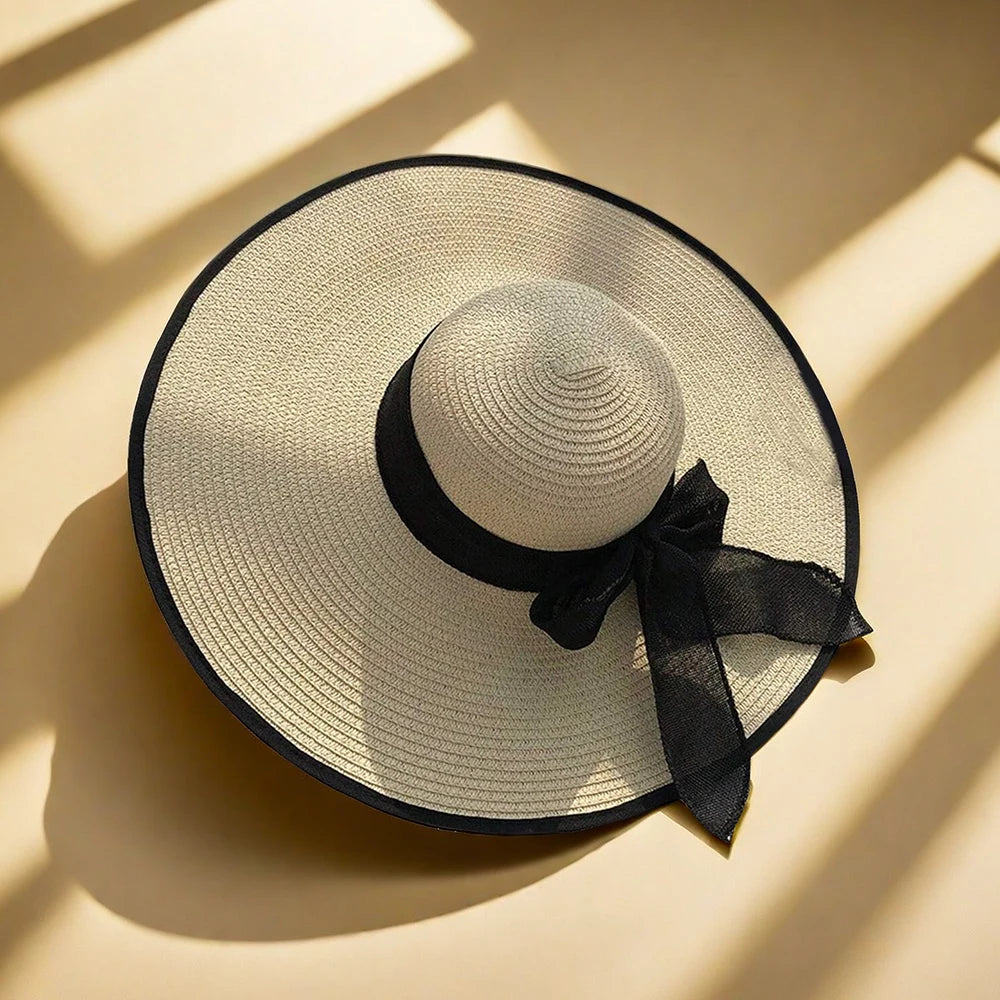 Cappello donna estivo in paglia con fiocco decorativo, tesa larga e colori eleganti