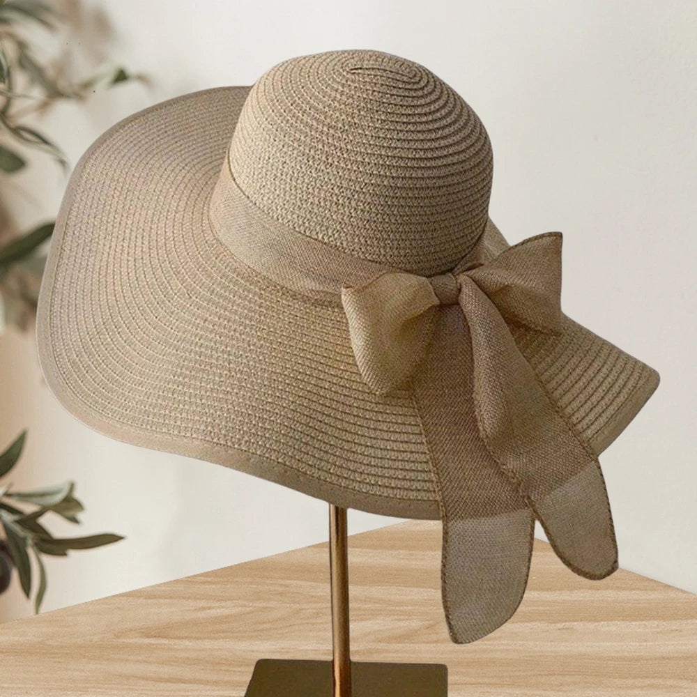 Cappello donna estivo in paglia con fiocco decorativo, tesa larga e colori eleganti