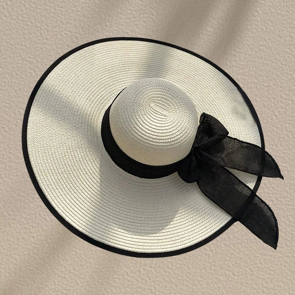 Cappello donna estivo in paglia con fiocco decorativo, tesa larga e colori eleganti