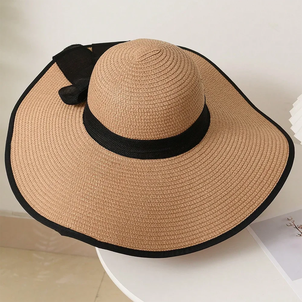 Cappello donna estivo in paglia con fiocco decorativo, tesa larga e colori eleganti