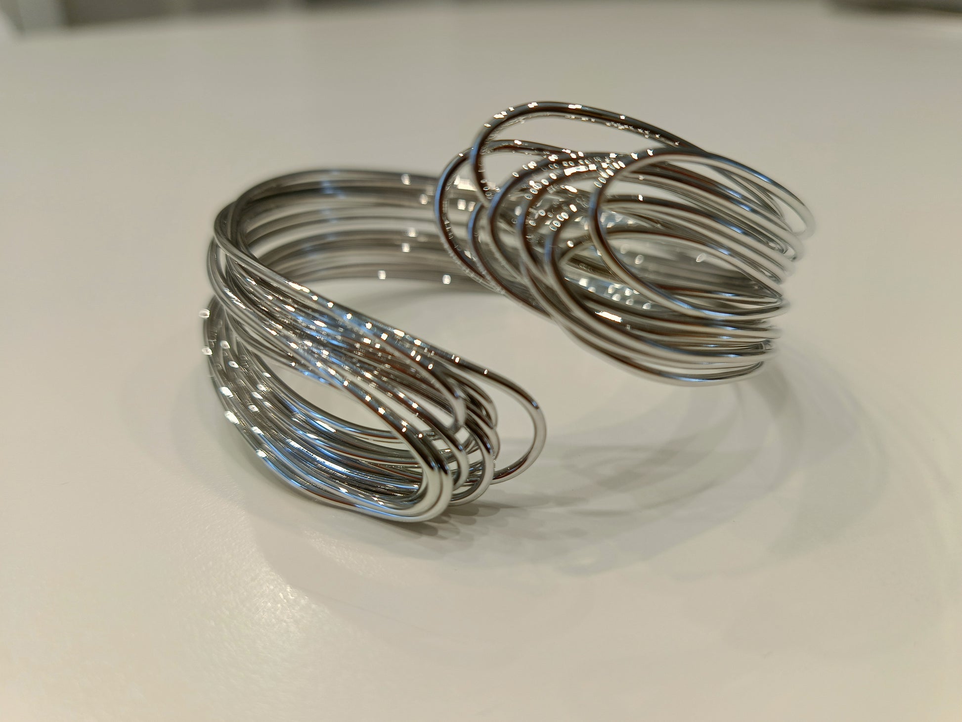 Bracciale rigido in acciaio in filo intrecciato