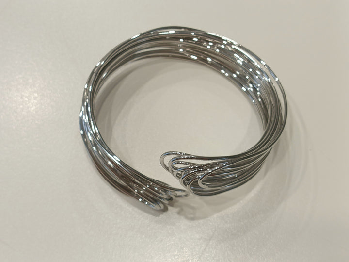 Bracciale rigido in acciaio in filo intrecciato