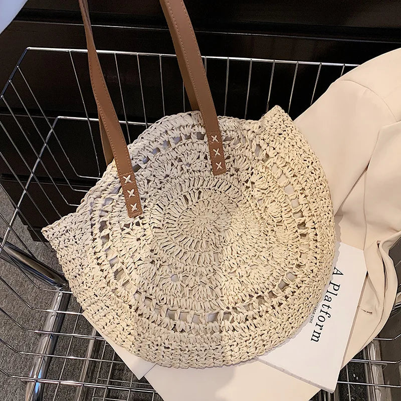 Borsa rotonda estiva in paglia intrecciata stile bohemien per donna