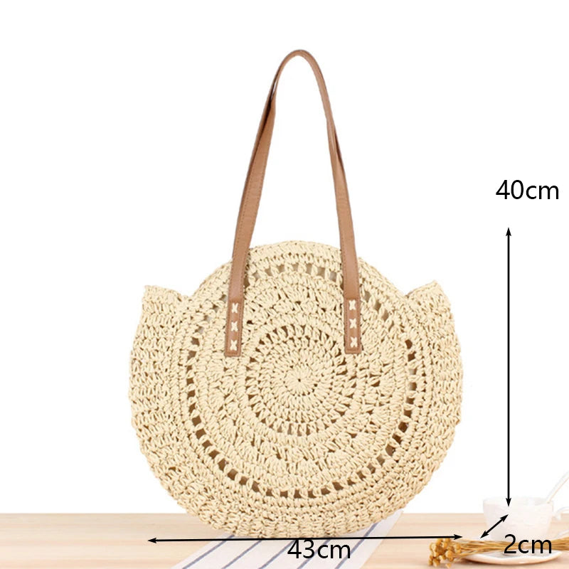 Borsa rotonda estiva in paglia intrecciata stile bohemien per donna
