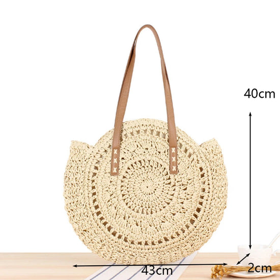 Borsa rotonda estiva in paglia intrecciata stile bohemien per donna