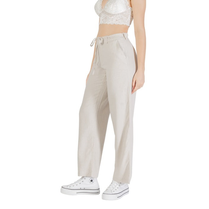 Pantaloni donna beige primavera estate in lino e viscosa, con zip, bottone e tasche anteriori.


