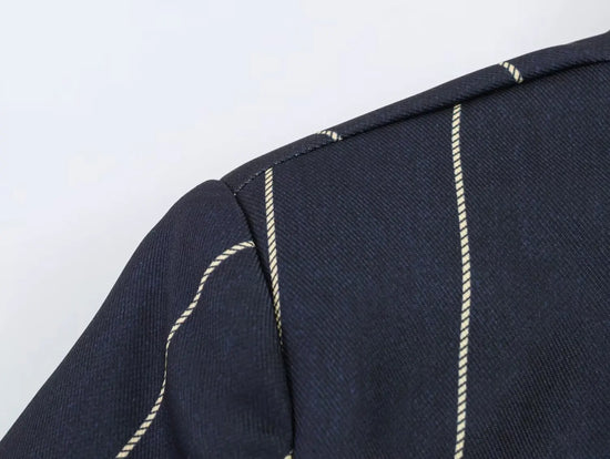 Completo donna a righe con giacca corta e pantaloni dritti