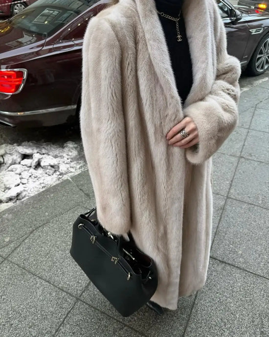 Cappotto donna in pelliccia sintetica dal taglio ampio
