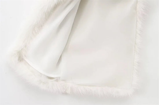 Maglia donna effetto pelliccia corta con girocollo