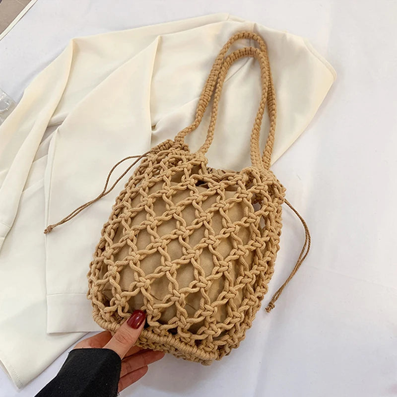 Borsa a secchiello in paglia intrecciata a mano – con coulisse e tracolla, perfetta per spiaggia e shopping