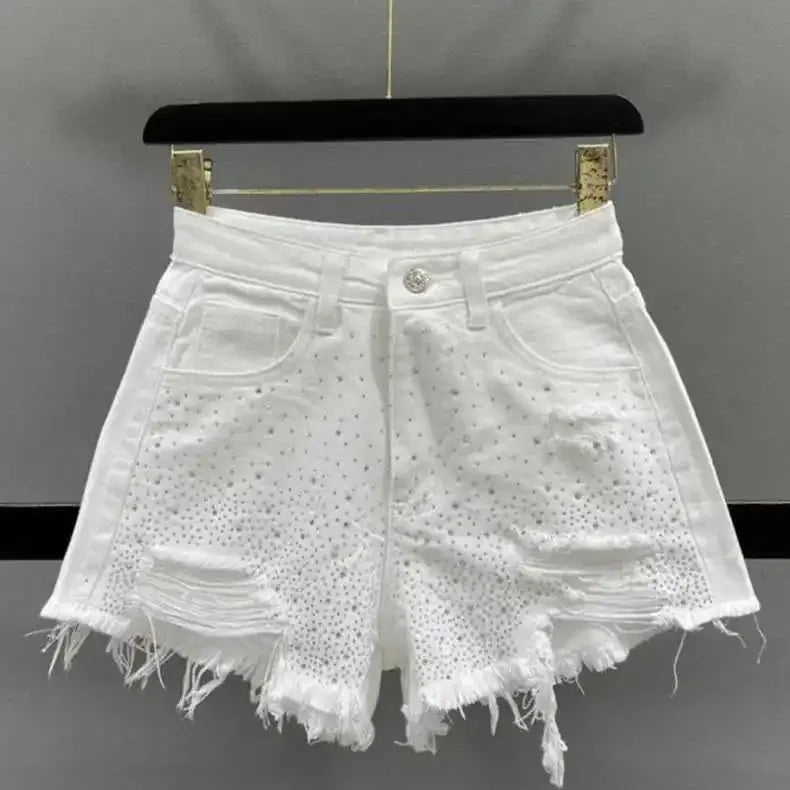 Shorts jeans donna strappati con strass – Vita alta estate 2025