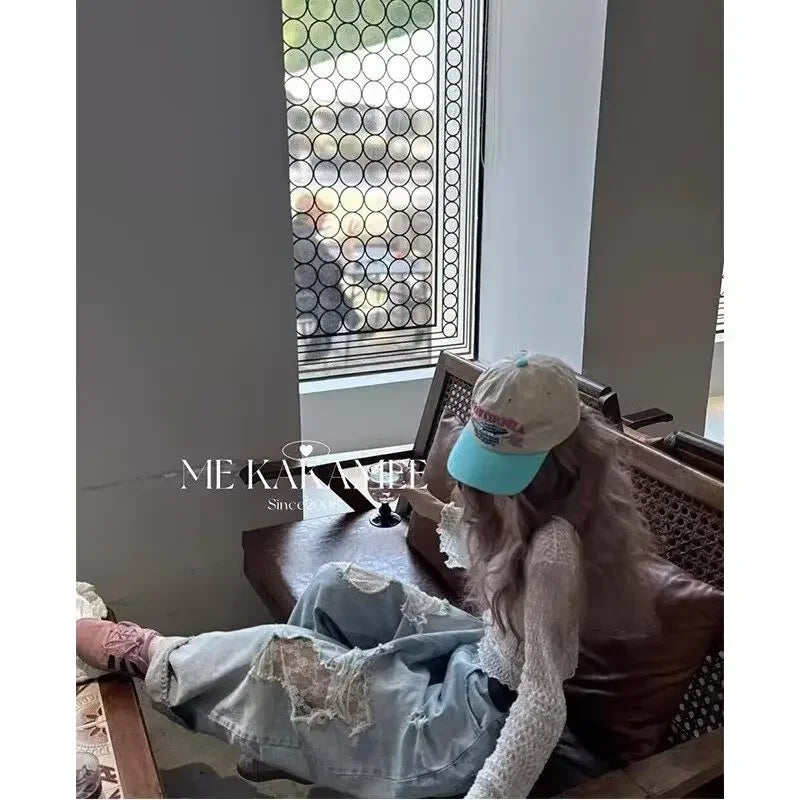 Jeans patchwork denim con inserti in pizzo – pantaloni larghi donna casual stile ribelle 2025