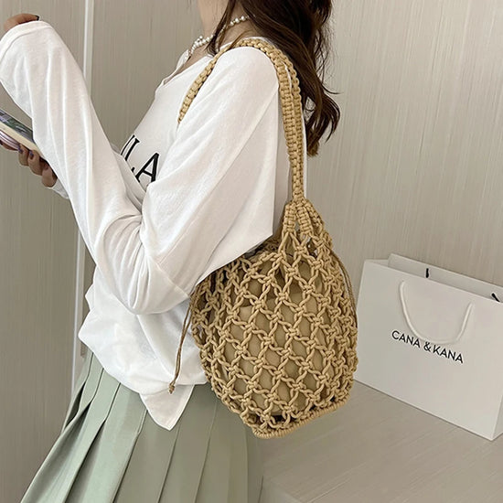 Borsa a secchiello in paglia intrecciata a mano – con coulisse e tracolla, perfetta per spiaggia e shopping