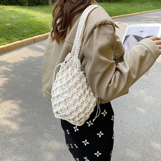 Borsa a secchiello in paglia intrecciata a mano – con coulisse e tracolla, perfetta per spiaggia e shopping