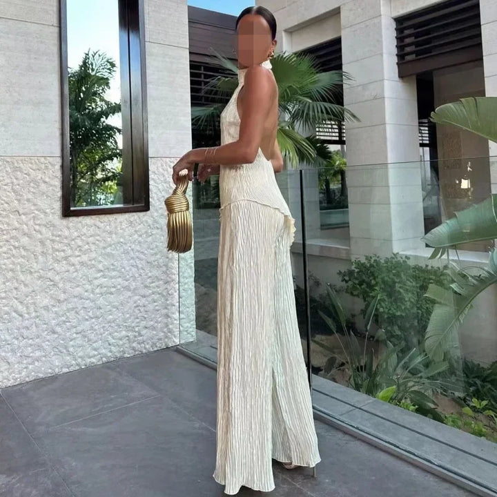 Set donna elegante con top irregolare + pantaloni a zampa bell bottom – completo fashion sexy per outfit da sera / casual chic