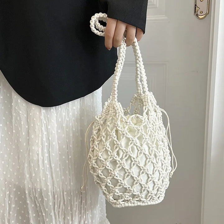 Borsa a secchiello in paglia intrecciata a mano – con coulisse e tracolla, perfetta per spiaggia e shopping