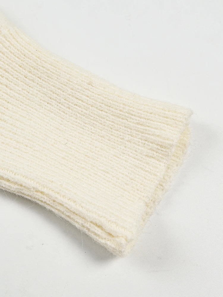 Maglione donna asimmetrico a collo alto e maniche lunghe