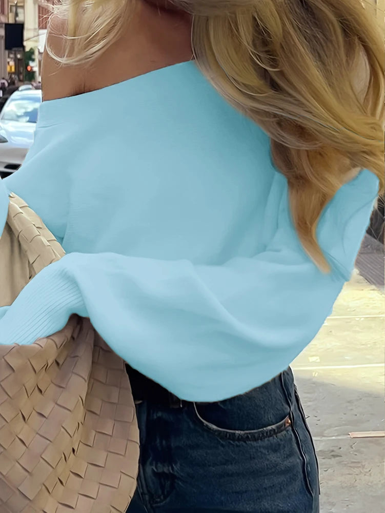 Maglione donna asimmetrico a collo alto e maniche lunghe