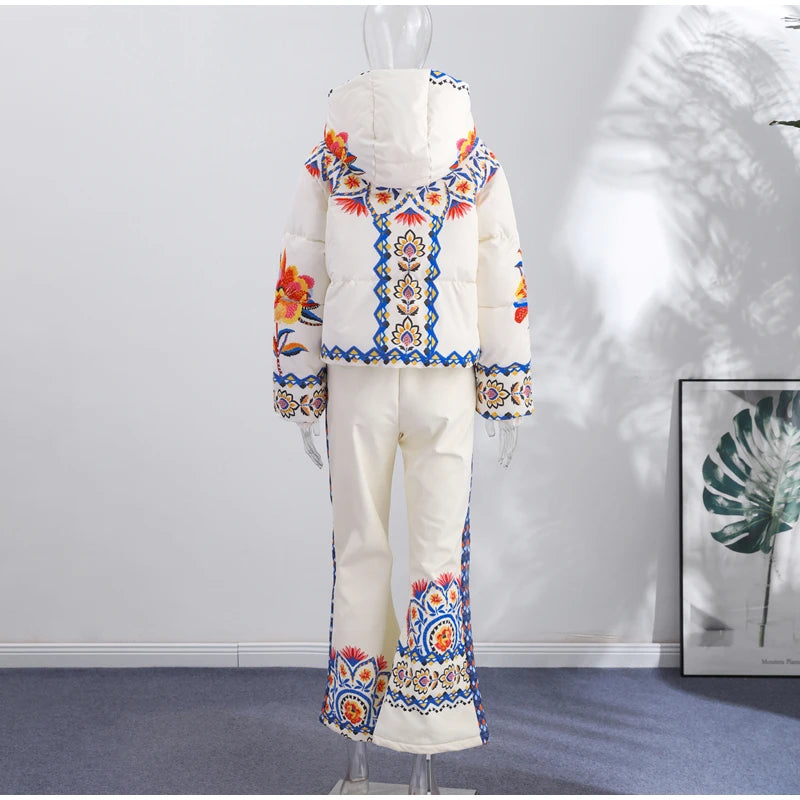 Tuta da neve donna con cappuccio, bianca o fantasia