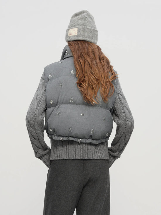 Piumino o gilet donna trapuntato con decorazioni - foto 27 della galleria